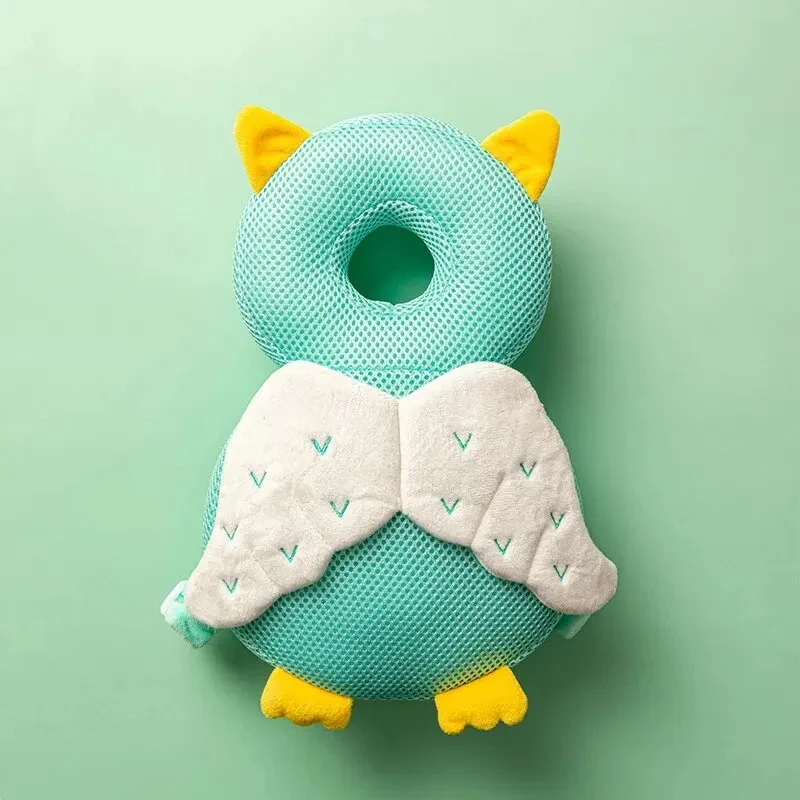 Coussin anti tête plate en forme d'oiseau